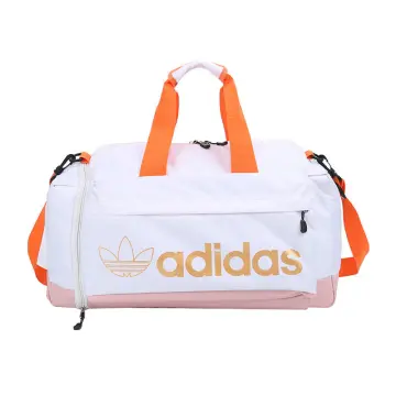 adidas Linear Duffel Bag Black / White Large and in charge of all of your  travel essentials, this adidas duffel bag can carry everything you need. A  wide-open main compartment holds a