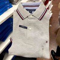 Tommy Hilfiger ของแท้ซื้อทอมมี่เสื้อโปโลของผู้ชายปกสีทึบลำลองธุรกิจตัวอย่างคลาสสิคหล่อแขนสั้นการค้าต่างประเทศ