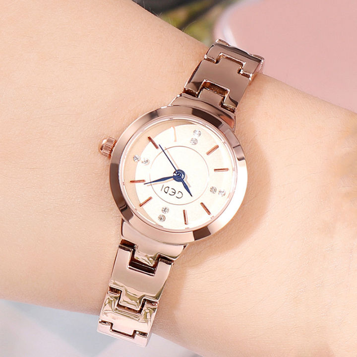 นาฬิกาควอตซ์กันน้ำทันสมัยสำหรับนักเรียนนาฬิกาผู้หญิงสายรัดเหล็กนาฬิกาผู้หญิงระดับไฮเอนด์ที่เรียบง่าย