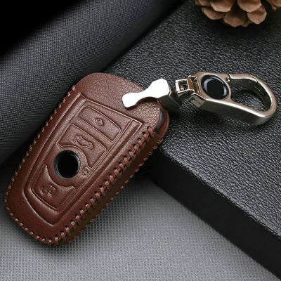 ◑ Leather Car Key Cover Case For BMW Serie 1 3 5 7 I3 M4 X1 F48 X5 F15 E70 X6 X3 G01 F24 X4 F30 F10 E46 Metal Key Ring Accessories