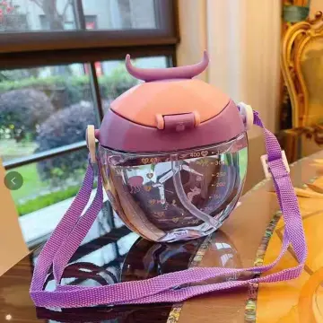 Drinking helmet with straws. Pink helmet with feathers