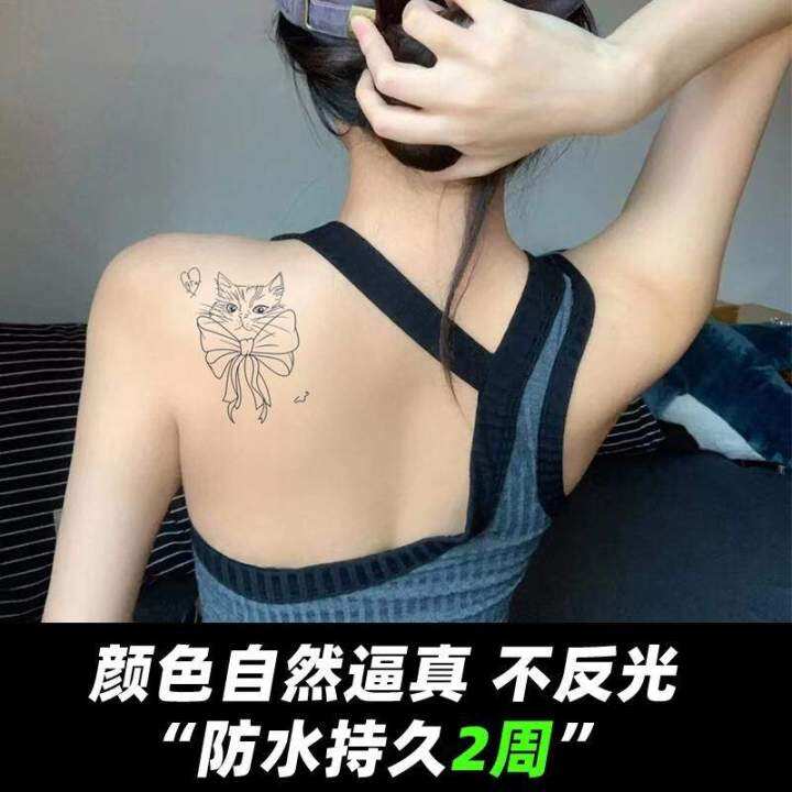 herbal-juice-tattoo-stickers-waterproof-female-long-lasting-simulation-bow-cat-tattoo-sexy-collarbone-high-end-stickers