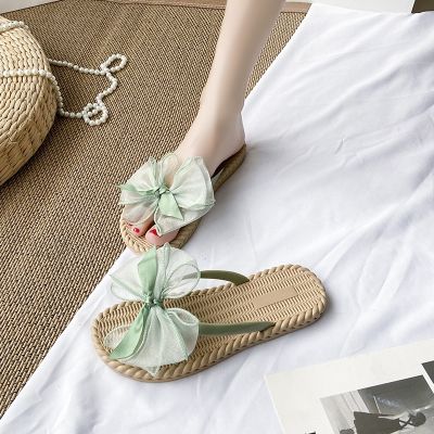 Slippers women the summer of 2023 new web celebrity bowknot flat outside joker cold water to wet soft bottom person word slippers