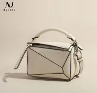 NUCELLE New European and American one-shoulder diagonal hand-held star with contrasting color pillow female bag