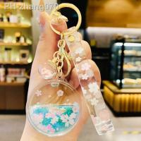 Metal acrylic cute cherry blossom quicksand couple keychain creative small gift mobile phone schoolbag car trailer keychainTH