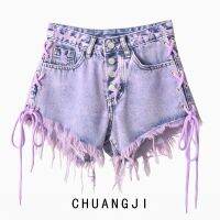 กางเกงขาสั้น Purple tassel lace-up denim shorts womens summer high-waisted breasted trendy raw-edged a-line wide-leg hot pants