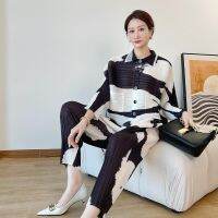 2023 Hot Miyake pleated suit for women  new fashion printed buttoned cardigan top slimming small leg pants two-piece set