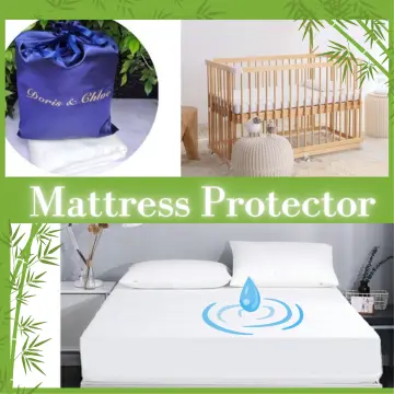 Oval crib mattress protector sale