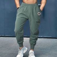 ใหม่ Mens Joggers สบายกางเกงลำลองกีฬาฟิตเนสแฟชั่น Skinny กางเกงวอร์มสีดำโรงยิม Jogger กางเกงแทร็ค