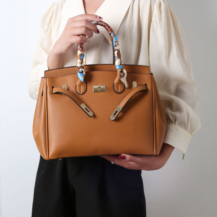 กระเป๋าหนังแท้ผู้หญิงกระเป๋าใหญ่-2023-ใหม่พรีเมี่ยมหนังนุ่มแม่กระเป๋าเดินทางกระเป๋าแสงหรูหราสำหรับผู้หญิง