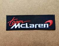 ตัวรีดติดเสื้อ อาร์มติดเสื้อ โลโก้ ตรา ยี่ห้อ มอเตอร์ไซค์ Team Mclaren Formula 1 team ฟอร์มูล่า วัน สำหรับตกแต่งเสื้อผ้า