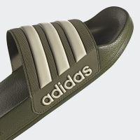 Adidas รองเท้าแตะ Adilette Shower Slides ลิขสิทธิ์แท้  ราคาป้าย 1000  GZ1010-สีเขียวขี้ม้าแถบครีม