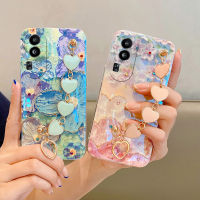 เคสโทรศัพท์สำหรับ OPPO Reno10 Pro Plus Pro + 5G ฝาครอบเนื้อนิ่ม TPU ลายดอกไม้เพชรเทียมพร้อมสร้อยข้อมือรูปหัวใจแฟชั่น