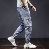 Joker jeans men loose man han edition fashion leisure harlan popular logo beam foot tooling splicing trousers