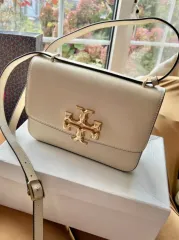 Tory Burch 61674 Kira Chevron Top Handle Satchel Gray Heron Detail :  Lambskin leather Flap with turnlock closure Removable strap with…