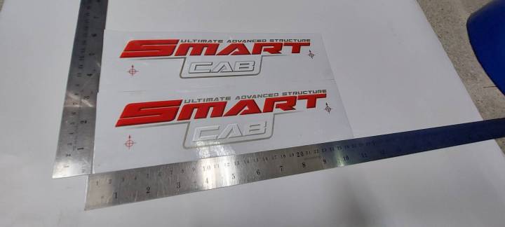 สติ๊กเกอร์ดั้งเดิม-ติดกระจกแค็ป-ด้านนอก-คำว่า-smart-cab-ultimate-advanced-structure-สำหรับรถ-toyota-vigo-smartcab-ปี-2008-2010-sticker-แต่งรถ-ติดรถ-โตโยต้า