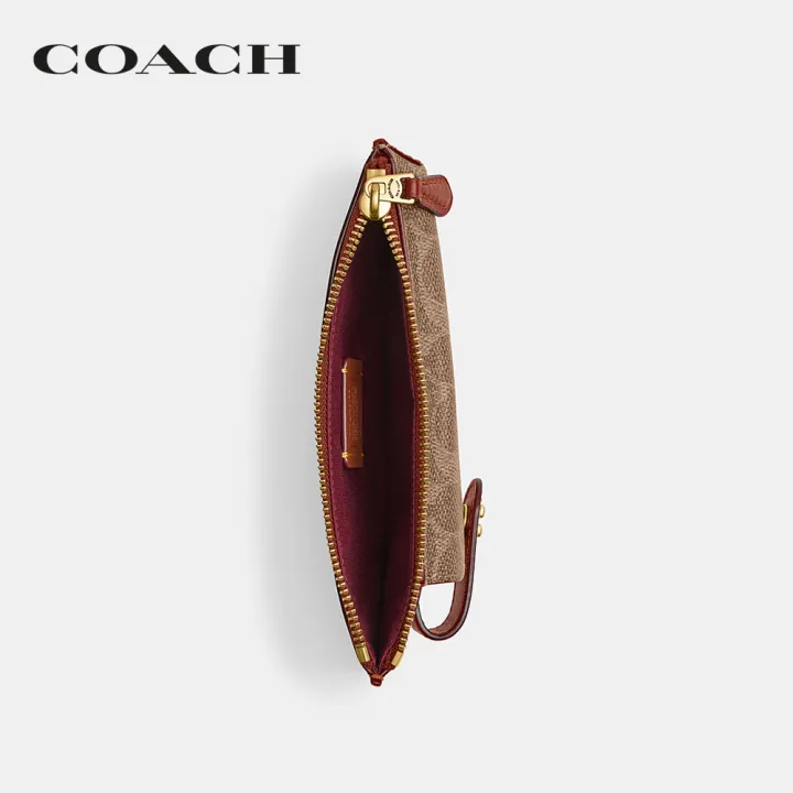 coach-กระเป๋าสตางค์ผู้หญิงรุ่น-essential-phone-wallet-in-signature-canvas-สีครีม-cj867-b4nq4