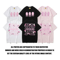 BAPE เสื้อยืดผู้ชายผู้หญิง Japan Limited Edition เสื้อยืด Pink Sakura Grove สีดำและสีขาวและสีชมพู M ~ 3XL