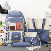 [Free ship] 2 023 new four-piece backpack junior high school primary large-capacity schoolbag casual manufacturers wholesale