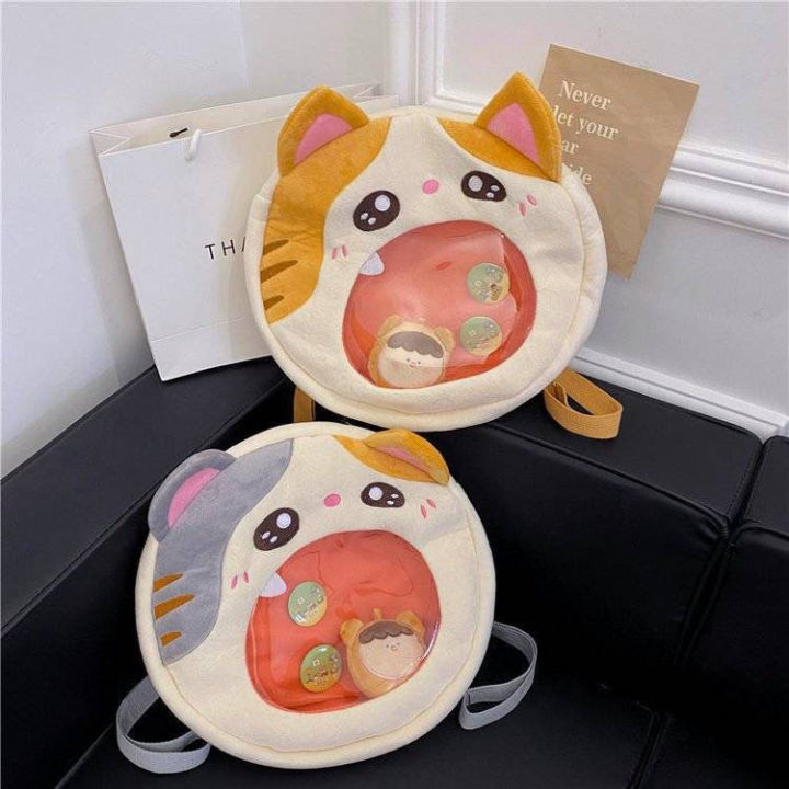 hatsune-บิ๊กปากถุงปวดน่ารักสีส้มแมวตุ๊กตากระเป๋าเป้สะพายหลังอะนิเมะกระจายตุ๊กตาเปลือกแสดงกระเป๋า