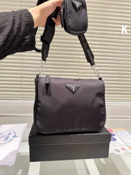 No flaws Silver Hardware Prada wd coin purse, Women's Fashion, Bags &  Wallets, Cross-body Bags on Carousell