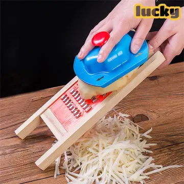 Multifunctional vegetable cutter household kitchen wiper shredder