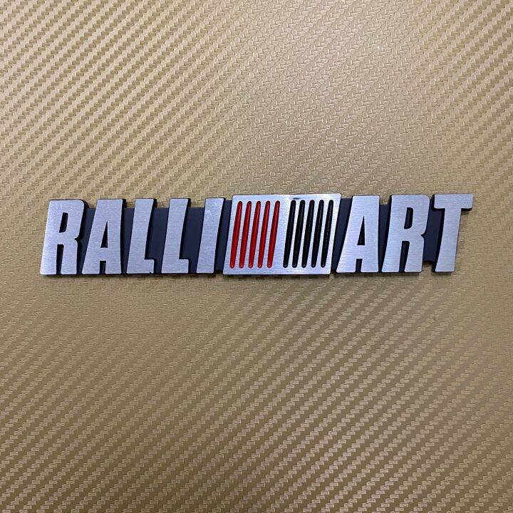 โลโก้* RALLI ART เงินขอบดำ งานอลูมิเนียม ขนาด* 3.2 x 17 cm ราคาต่อชิ้น