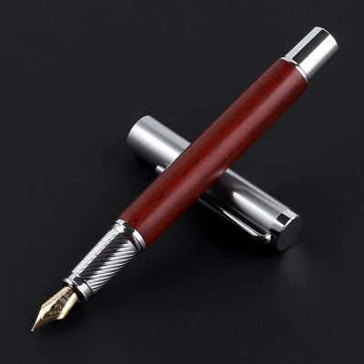 ปากกาเขียนตัวอักษรประดิษฐ์เซ็นชื่อทำจากไม้โลหะปากกาหมึกซึมหัวปากกา Iraurita หรูหราโลโก้ออกแบบได้ตามที่ต้องการ