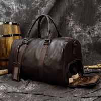 กระเป๋าหนังแท้สุดหรูบุรุษสุภาพสตรีกระเป๋าเดินทาง Cowhide Carry On Duffel Bag กระเป๋าเดินทางกระเป๋าสะพายไหล่บุรุษสุภาพสตรีวันหยุดสุดสัปดาห์