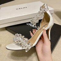 White glass slipper high heel open-toe sandals with a buckle and a thin heel for a holiday shoe