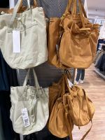 Original ᷂ flagship Uniqlo men and women with the same style all-match drawstring messenger bag shoulder bag bucket bag large capacity y458202