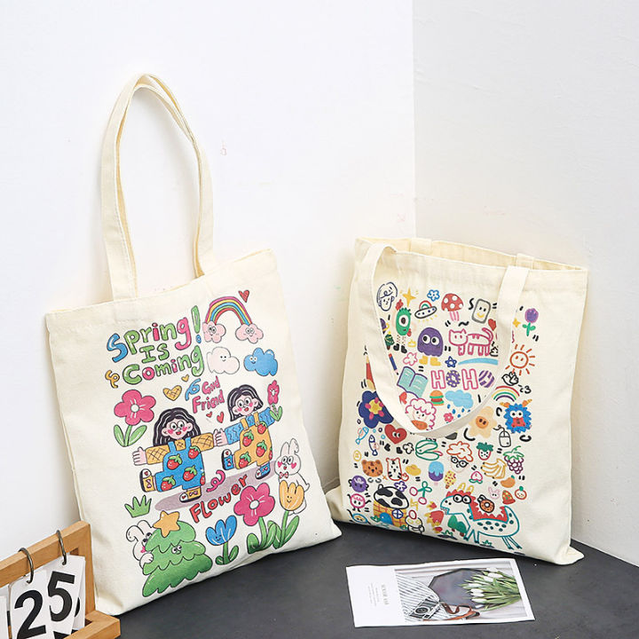 tote-bag-กระเป๋าผ้าสุดคิ้วท์-เนื้อผ้าดี-สีสวย-ลายสกรีน-น่ารัก-กระเป๋าผ้าดิบสีครีม-มีลาย-กระเป๋าผู้ชายและผู้หญิง-กระเป๋าสะพาย