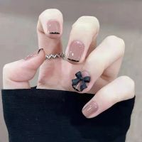[COD] Manicure patch wearing armor simple and versatile black edge French bow short detachable fake nail finished product