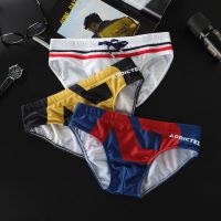 ?  Mens swimming trunks mens low waist waterproof professional swimming trunks briefs mens European and American youth printed beach pants briefs