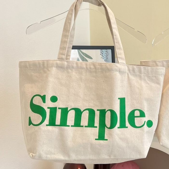 justbehappy-tote-bag-กระเป๋าผ้าลดโลกร้อน-สกรีนลาย-simple-amp-goodluck