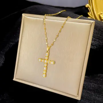 LOT:277 | CARTIER - an 18ct gold diamond cross pendant, with chain.