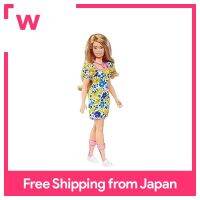 ตุ๊กตา Barbie Fashionista ในชุดเดรสลายดอกไม้สร้างขึ้นโดยความร่วมมือกับสังคมสร้อยข้อมือริบบิ้นแห่งชาติ