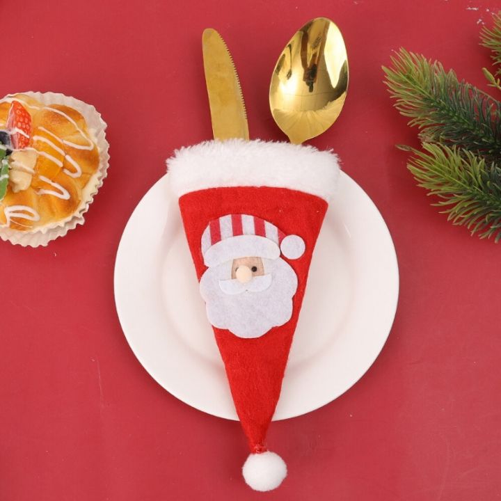 merry-christmas-2024หมวกคริสต์มาสของตกแต่งโต๊ะงานเลี้ยงปีใหม่ชั้นวางของบนโต๊ะอาหารหมวกคริสต์มาส2-4ชิ้นกระเป๋าใส่เครื่องใช้บนโต๊ะอาหาร