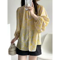 Orange zhi in the spring of 2023 French style restoring ancient ways is prevented bask in clothes pure desire wind long-sleeved shirt female round collar chiffon blouse thin 933