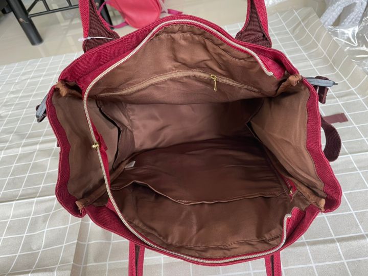 กระเป๋าanello-10-pocket-2-way-backpack-ผ้าแคนวาส-มีป้ายกันปลอม-กระดุมแบบใหม่-คำว่า-carrot-co-กระเป๋าเป้-กระเป๋าสะพายหลัง