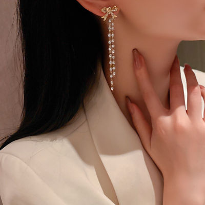 925 เข็มเงินเกาหลีแฟชั่นบุคลิกภาพต่างหูเพชรมุกต่างหูพู่ยาว925 Silver Needle Korean Fashion Personality Earrings Diamond Pearl Bow Long Tassel Earrings