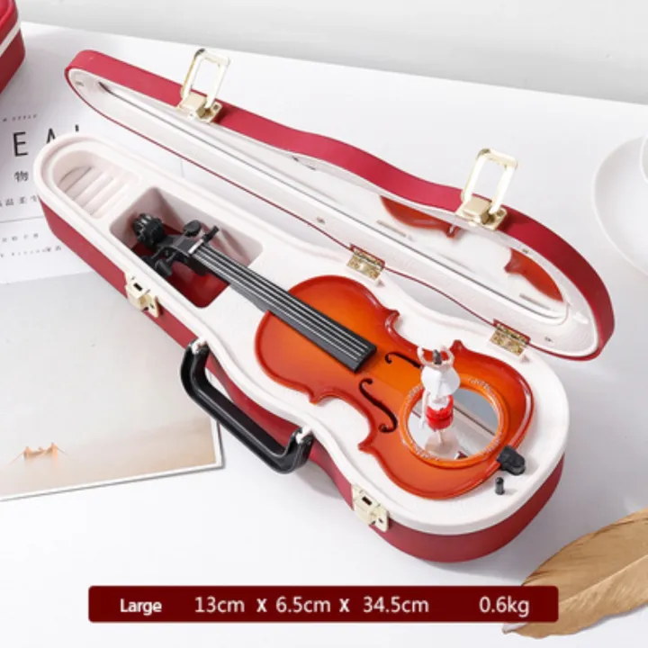 classical-elegance-literary-violin-music-box-creative-spin-dancing-girl-hand-carrying-a-birthday-present