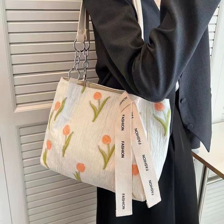 กระเป๋าความจุขนาดใหญ่สำหรับผู้หญิงฤดูร้อน-2023-แฟชั่นใหม่ผ้าใบกระเป๋าสะพายเย็บปักถักร้อยเฉพาะกลุ่มพรีเมี่ยมความรู้สึก-logitech-กระเป๋า