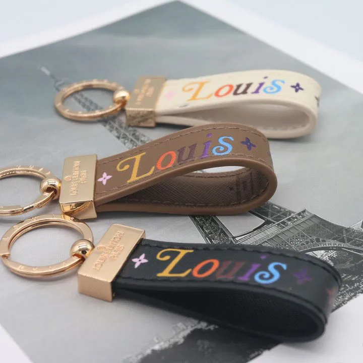 Louis Vuitton New Wave Dragonne Key Holder M63746 : : Clothing,  Shoes & Accessories