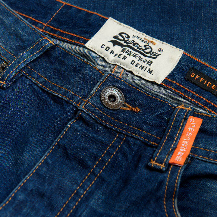 superdry-new-officer-slim-กางเกงยีนส์-สำหรับผู้ชาย-สี-monty-blue-lite