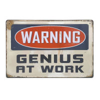 ป้ายสังกะสีวินเทจ Warning : Genius at Work (ปั๊มนูน), ขนาด 20x30 ซม.