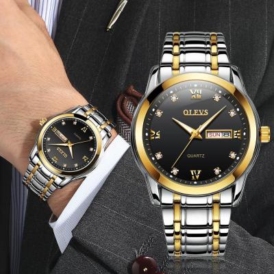 ธุรกิจนาฬิกาผู้ชาย OLEVS เข็มขัดคู่ปฏิทินเหล็กกันน้ำนาฬิกาสมาร์ทวอท์ชนาฬิกาผู้ชายธุรกิจแจม