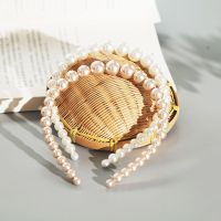 Vivienne Westwood High-end French quality pearl small fragrance headband womens size pearls to increase the top of the head for going out retro temperament headband