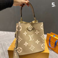 New Women S Bucket Bag High Quality Cowhide Portable/Shoulder Women S Fashion Temperament Messenger Bag.กระเป๋า