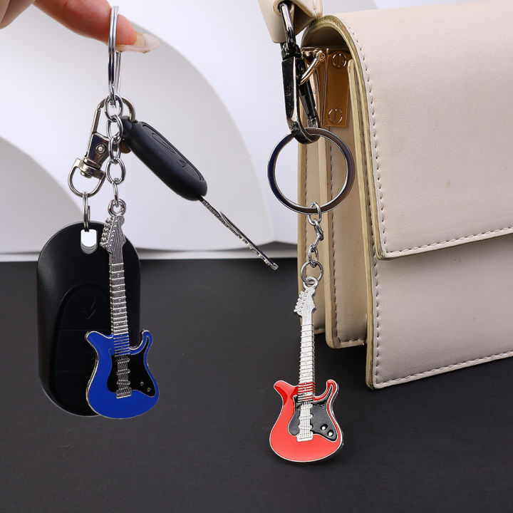 พวงกุญแจพวงกุญแจรถพวงกุญแจกีต้าร์โลหะสุดสร้างสรรค์กระเป๋าจี้ของขวัญคนรักเพลง
